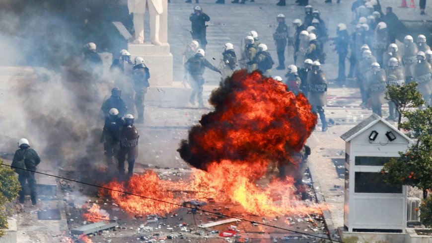 Police in Greece fire tear gas as protest marking deadly train crash anniversary turns violent