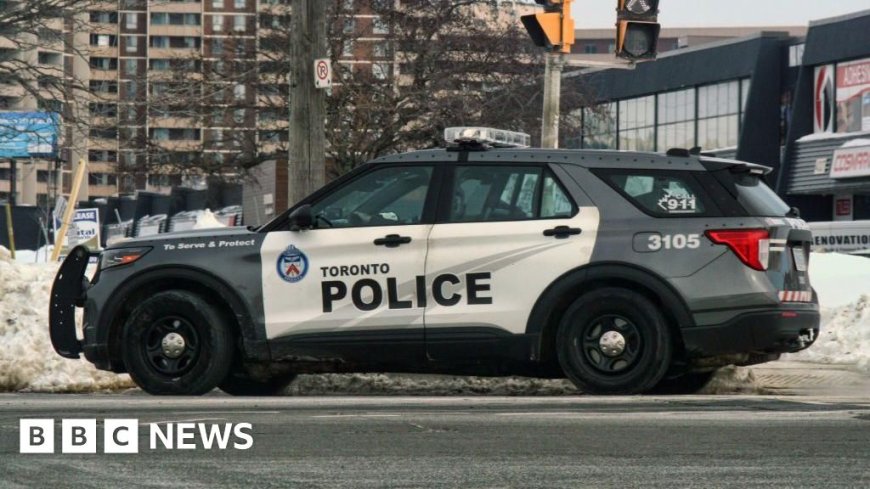 Three suspects at large after 12 injured in Toronto pub shooting