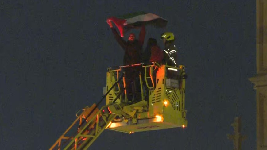 Man holding Palestinian flag who climbed up Big Ben clock tower comes down