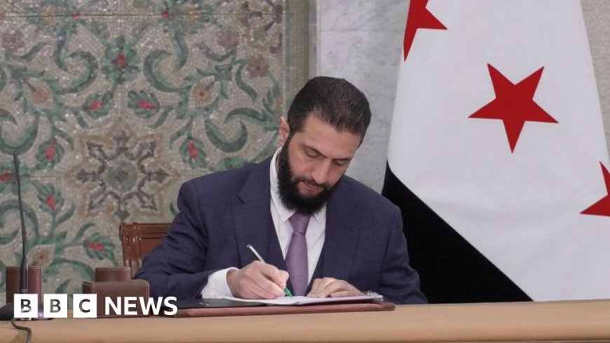 Syria leader signs temporary constitution for five-year transition